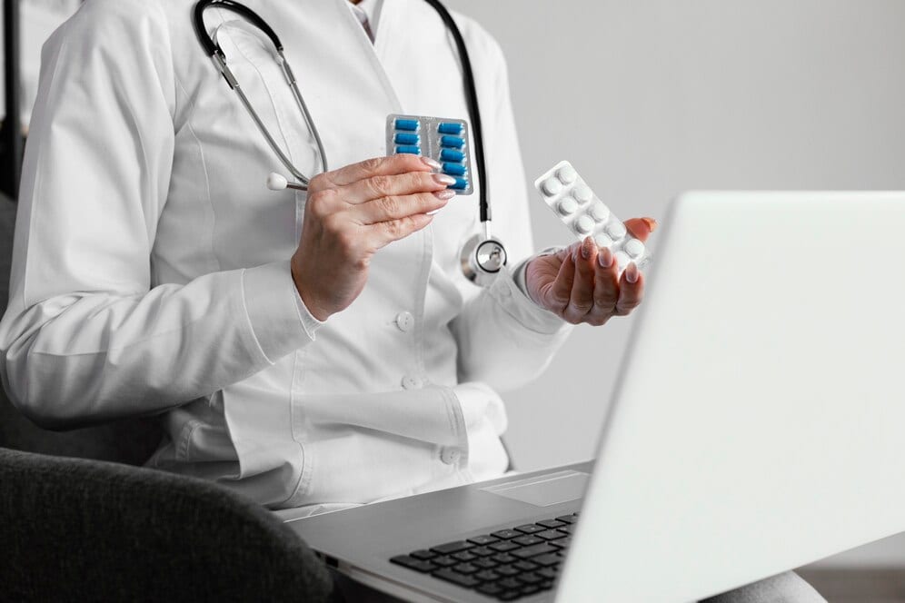 close up doctor holding pills 23 2148872987 Dr Faseeha Homeopath General Consultation