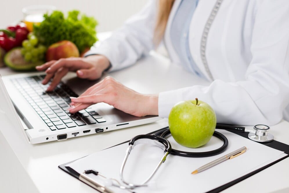 diet concept with female scientist healthy food 23 2148193255 Dr Faseeha Homeopath Food Intolerance Tests